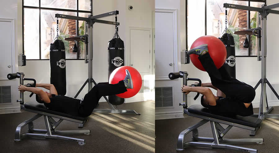 Leg Lift on Decline Bench with Medicine Ball Exercise