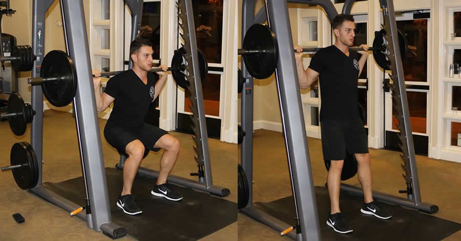 Smith Squat Performed by Male Personal Trainer