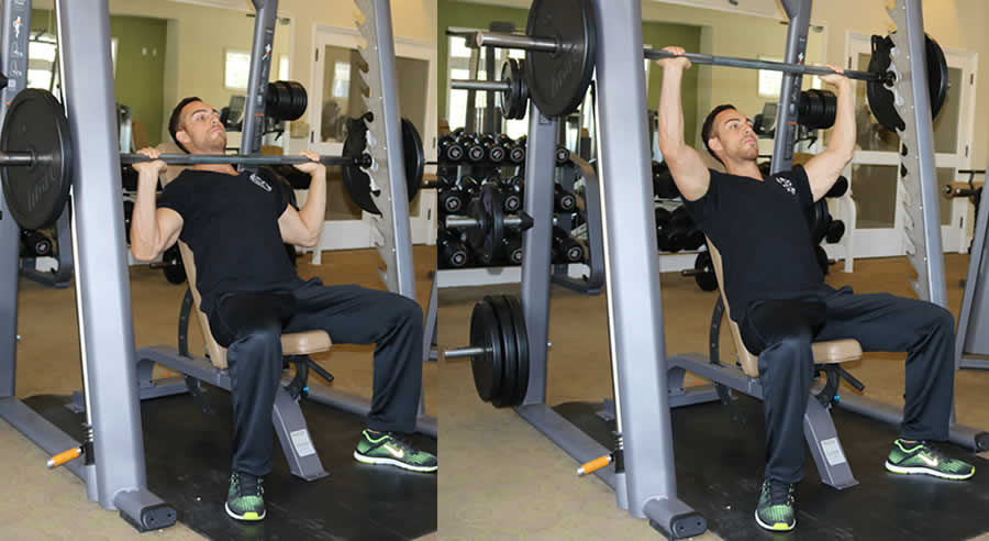 incline shoulder smith machine press performed by male personal trainer