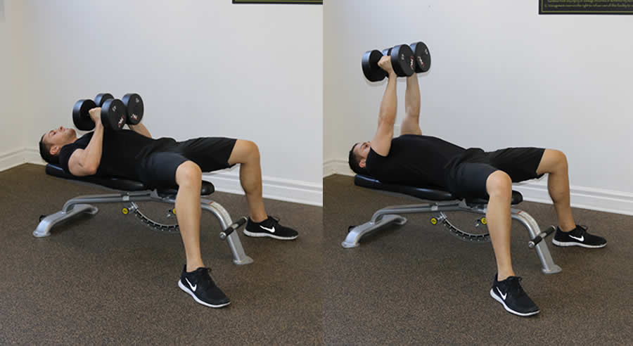 flat dumbbell squeeze press performed by male personal trainer