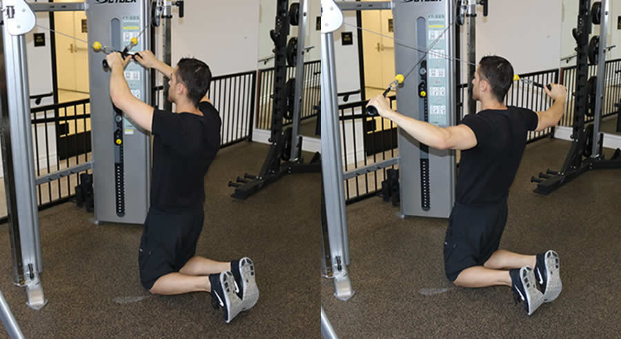high cable reverse fly from knees performed by male personal trainer