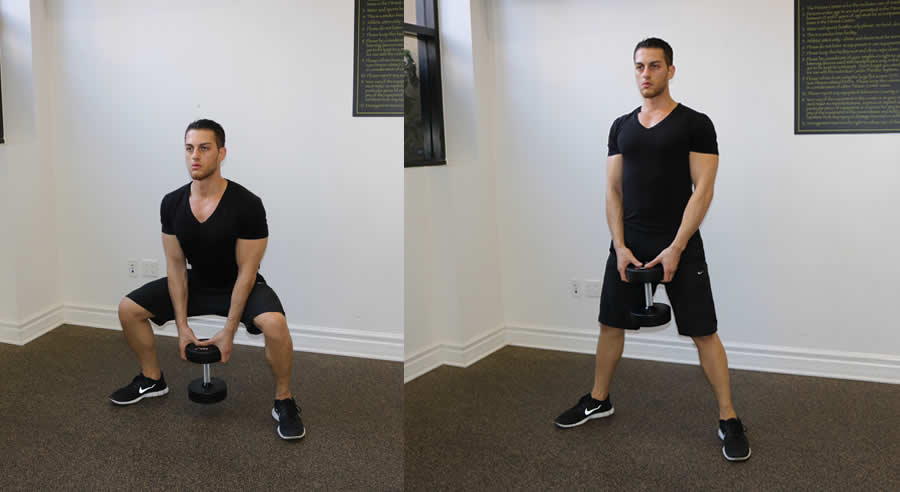sumo squat performed by male personal trainer
